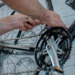 mechanic fixing a bike