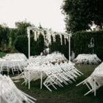 elegant outdoor wedding reception setup with white decor