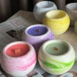 colorful marble candles on a tabletop