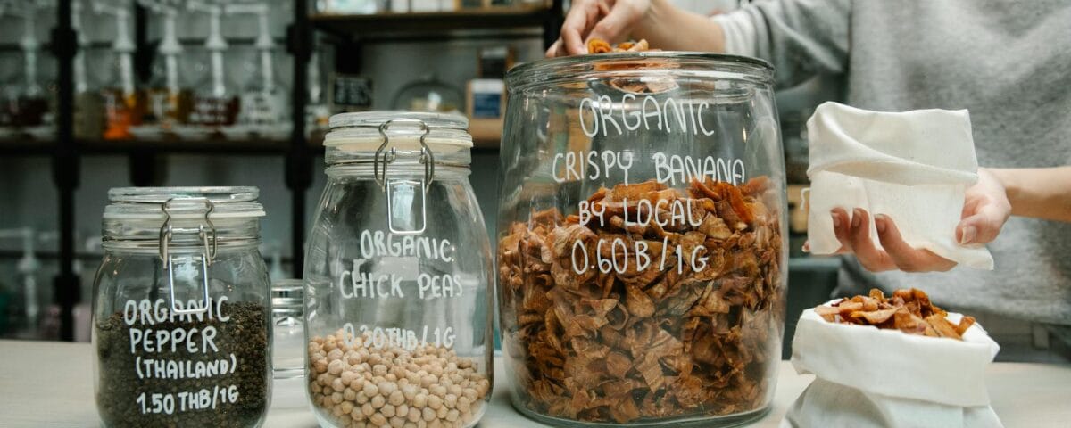 variety of organic products on glass jars