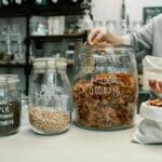 variety of organic products on glass jars