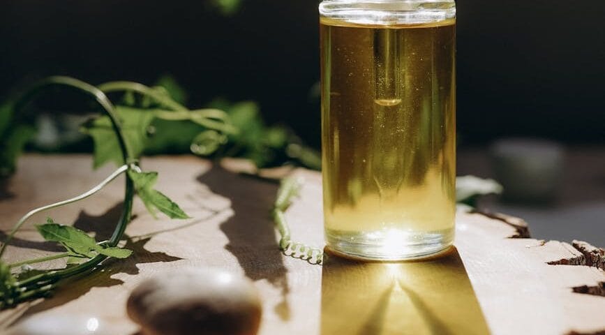sunlight over flask on table